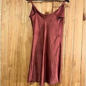 Pink satin mini dress, great for lounging or an evening out.